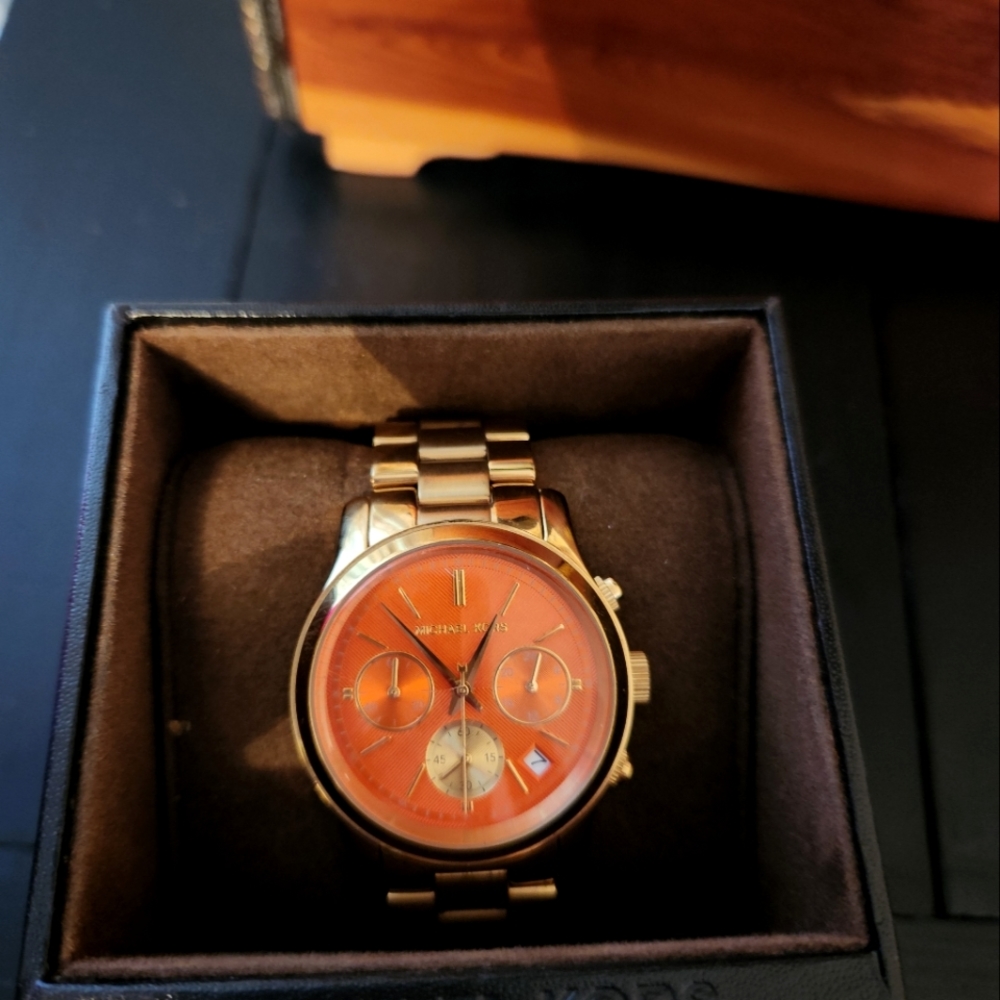 Michael Kors watch gold with orange face